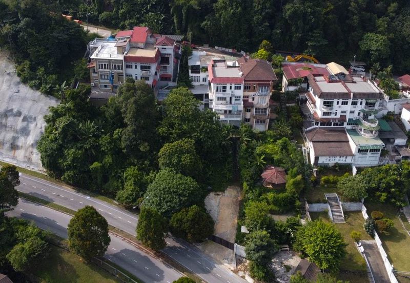 Bungalow on hillside with magnificent view of Bukit Melawati. Taman Melawati. 