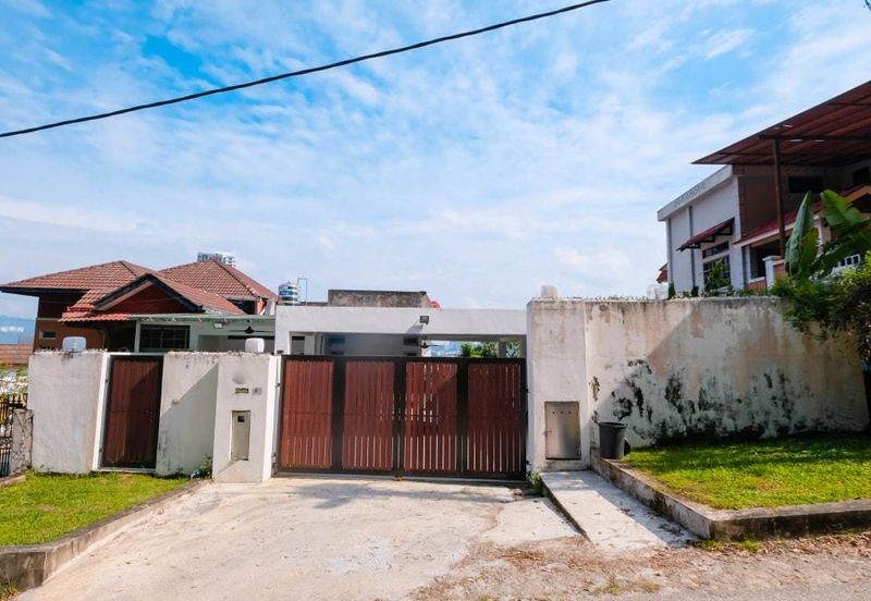 Bungalow on hillside with magnificent view of Bukit Melawati. Taman Melawati. 