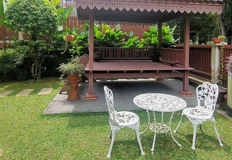 Lovely tropical garden with koi pond bungalow home with 24 hours gated guarded security system