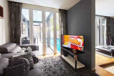 24 hours gated guarded modren 2 storey home with pool and 10 car parks