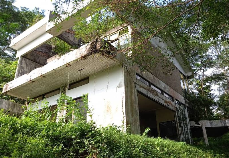 residential land with an abandoned bungalow 