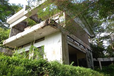 residential land with an abandoned bungalow 
