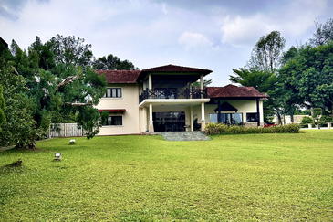 Double-Storey Bungalow with Turf Club View in Jesselton Heights.