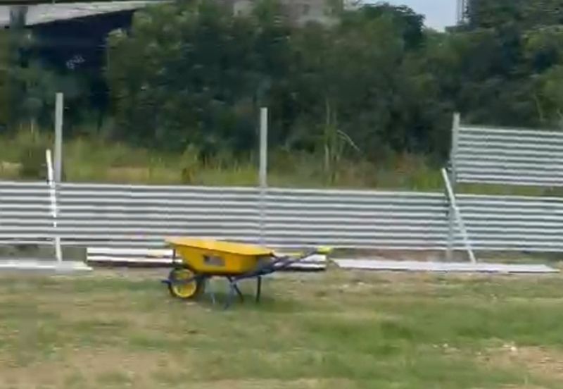Flat land beside KL-Ipoh Trunk Road near Komuter