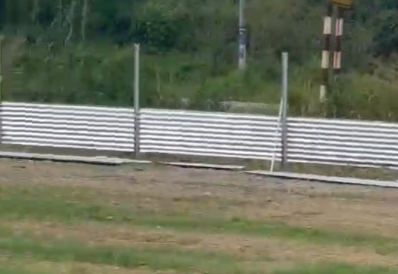 Flat land beside KL-Ipoh Trunk Road near Komuter