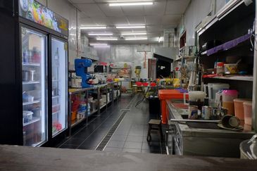 A beautifully landscaped bungalow café - business for sale