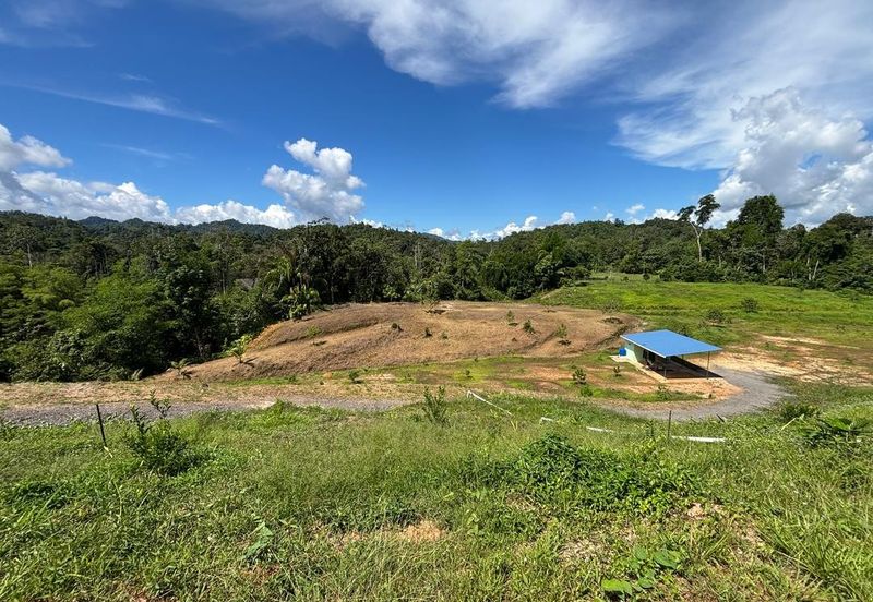 Kinarut land with house and fruit trees