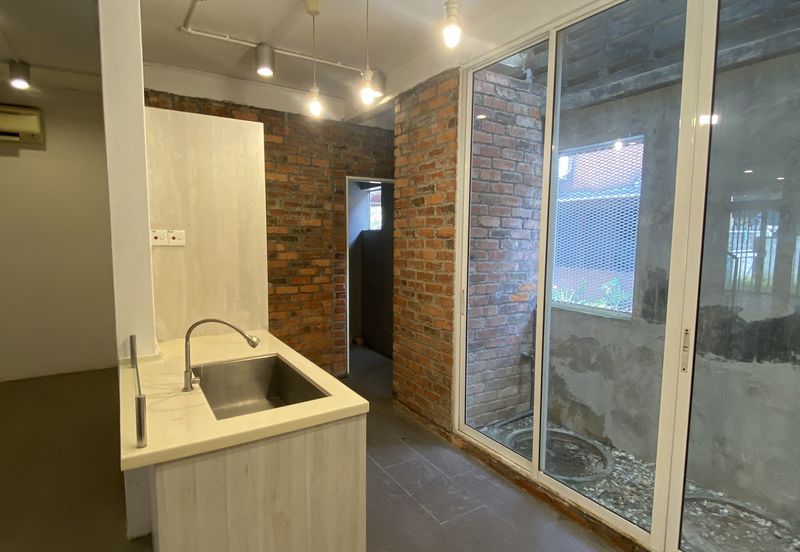 Renovated 1,260 sqft double-storey in Lorong Kurau, Bangsar: 3 beds, 2 baths, extended kitchen, chic brick walls—prime location!